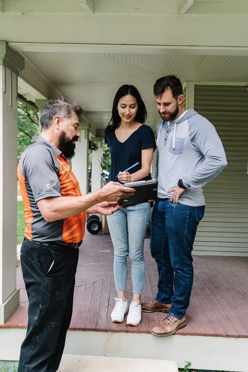 Professional movers consulting with customers in Morrisville NC