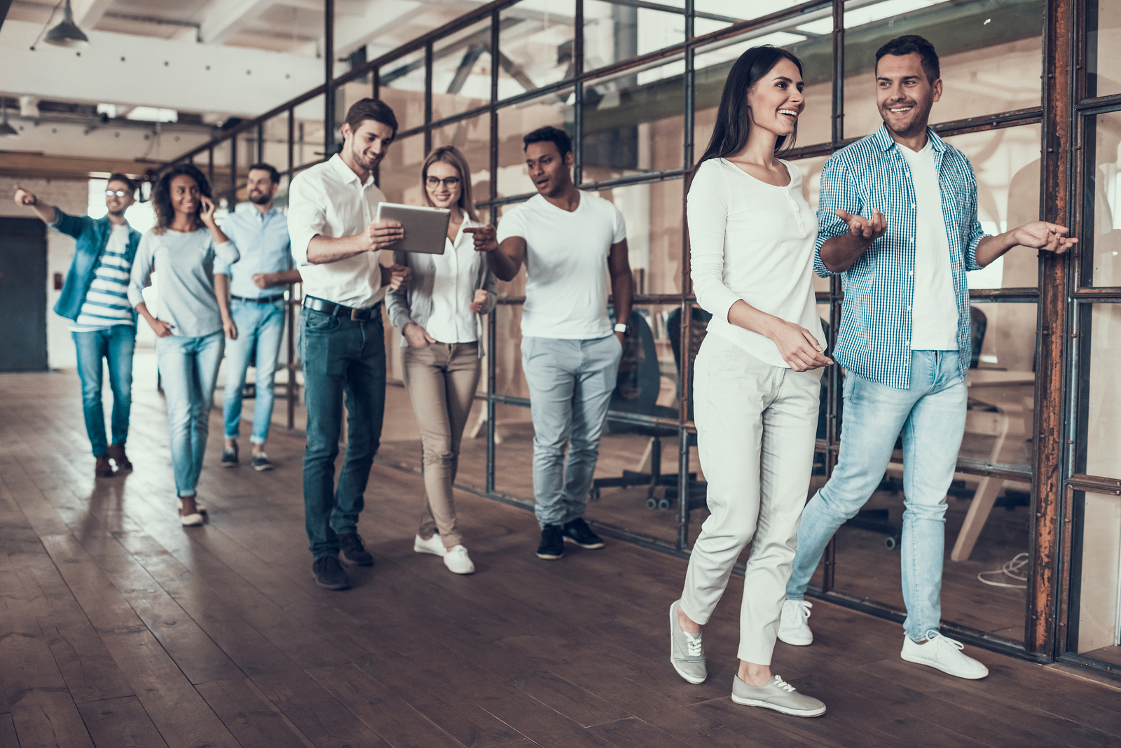 Group Of Young Business People Walking Together. Successful Busi